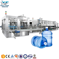 Nouvelle machine de remplissage d'eau entièrement automatique New Peak 900BPH pour barils de 3/5 gallons, idéale pour les usines d'eau potable
