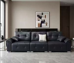 Canapé en cuir noir de luxe inclinable électriquement, canapé moderne 3 places à mouvement électrique avec siège extra profond et port USB pour salon - Product Image 1