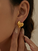 Boucles d'oreilles en acier inoxydable 18K anti-ternissement, design artistique, cœur fondant en métal liquide