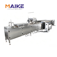 Nouvelle machine automatique de moulage de barres chocolatées pour bonbons, noix et matières premières, haute productivité 12-20 moules/min