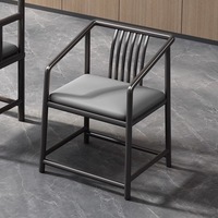 Nouveau fauteuil Taishi de style chinois avec accoudoirs ronds, structure métallique, assise rembourrée, mobilier moderne pour salon et maison