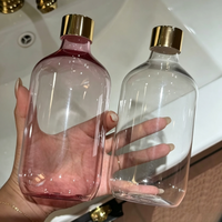 Bouteille diffuseur d'arômes en plastique PET transparent rose de 500 ml, rechargeable, avec bouchon à vis et design sérigraphié pour hydrolat