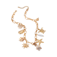 Chaîne à maillons tendance pour femme avec pendentif soleil, breloques étoile de mer et coquillage, style vacances, idéale pour la plage et les voyages, bijoux d'été