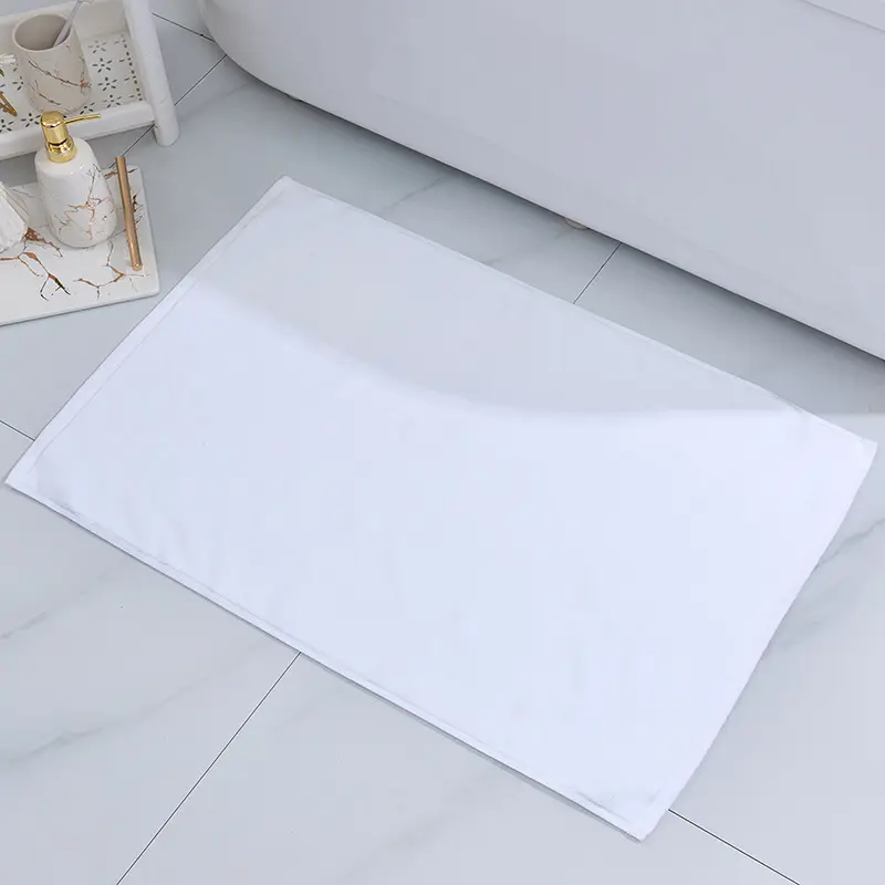 Cina produttore all'ingrosso durevole bagno antiscivolo tappetino 32S 100% cotone spugna bianco semplice tappetino da bagno per Hotel