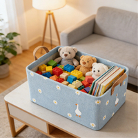 Panier de rangement pliable en lin bleu clair avec imprimé marguerites et oies, poignées en tissu renforcé pour l'organisation de la chambre d'enfant et du placard