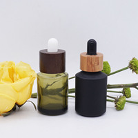 Bouteille compte-gouttes de 30ml en porcelaine, 1oz, épaule inclinée, vert olive, blanc, noir avec couvercle de Texture en bois foncé