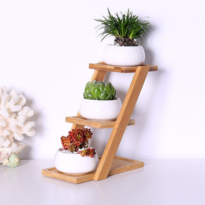 Petit support <span class=keywords><strong>de</strong></span> plante mobile personnalisable présentoir <span class=keywords><strong>de</strong></span> fleurs d'intérieur en bois <span class=keywords><strong>de</strong></span> bambou multicouche pour centre commercial fini en <span class=keywords><strong>peinture</strong></span> - Product Image 3