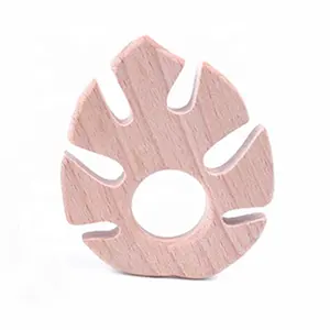 <span class=keywords><strong>Mordedor</strong></span> sensorial para bebé, <span class=keywords><strong>mordedor</strong></span> de madera de haya <span class=keywords><strong>Natural</strong></span> personalizado con forma de hoja, juguetes sensoriales para bebé, venta al por mayor - Product Image 1