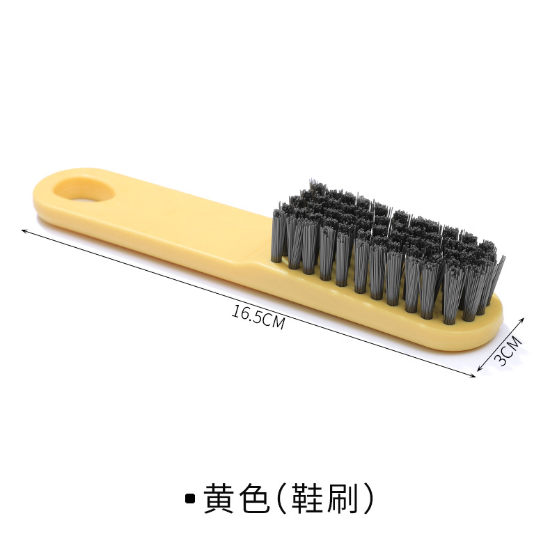 Brosse à chaussures jaune