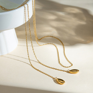 ERESI <span class=keywords><strong>Collier</strong></span> double couche infiniment coquillage <span class=keywords><strong>Collier</strong></span> plaqué or 18 carats avec long pompon en coquillage pour femmes - Product Image 5