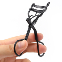 Recourbe-cils en métal noir mat en gros sous marque privée avec poignée à double boucle à ressort pour un rehaussement naturel des cils