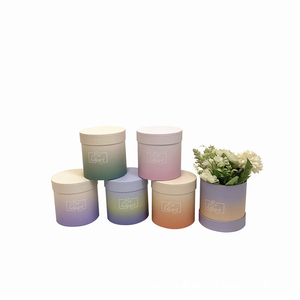 Flores de lujo personalizadas preservan rosas rojas flores embalaje caja cilíndrica papel Kraft revestimiento UV hecho a mano - Product Image 1