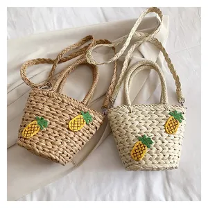 Modische beliebte Raffia-Handtasche Fruchtmuster Kordelzug Strand Rattan-Tasche gewebte Damen-Taschen Handtasche