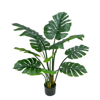 Bon marché Prix Grande Feuille En Plastique Faux Intérieur Petite Plante Artificielle Monstera Arbre En Pots Pour Table Décor De Bureau