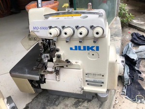 Machine à coudre surjeteuse industrielle à grande vitesse d'occasion Juki série 6900S 6914S/6904 à quatre fils - Product Image 2