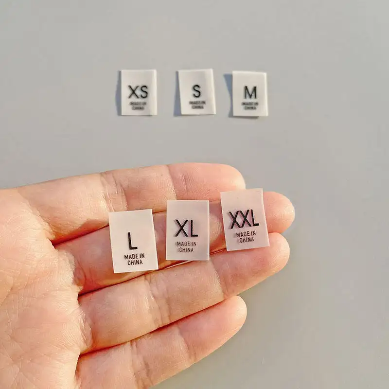 Etiquetas de tamaño grueso de silicona de alta calidad, accesorios de ropa, etiqueta de tamaño de ropa de goma pequeña, logotipo 3D impreso