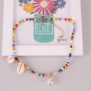 Collar de cuentas de semillas coloridas hecho a mano con perlas y conchas, diseño asimétrico para mujer, joyería de fiesta, 5x7 pulgadas - Product Image 1