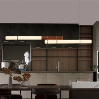 Suspension moderne en fer forgé avec double suspension réglable et LED, idéale pour table à manger ou îlot de cuisine