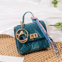 Mini sac en PU porte-clés, pochette de rangement pour rouge à lèvres, écouteurs et pièces de monnaie, petit sac à main mignon, breloque pour clés de voiture, ornement, logo personnalisé disponible