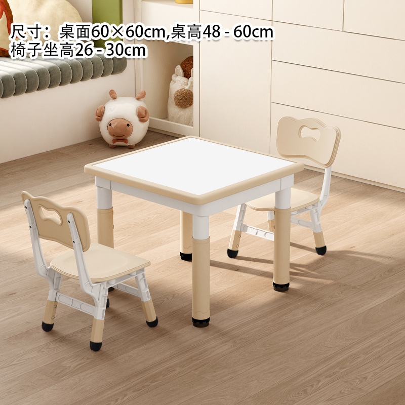 Whiteboard, wooden table and two chairs