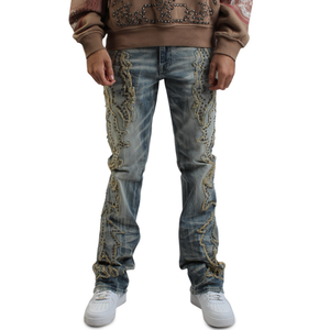 ג'ינס מתרחב לגברים, אופנת רחוב איכותית בהתאמה אישית, דגם Y2K, כחול שטוף, עם קישוטי ניטים וטלאים, מבד דנים כותנה. - Product Image 1