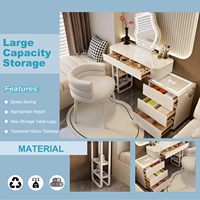 Coiffeuse moderne en MDF écologique avec haut-parleur Bluetooth, station de charge, 5 tiroirs, tabouret et miroir éclairé pour chambre à coucher