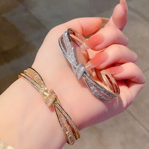 <b>Copper</b> Alloy Crisscross Bow <b>Bracelet</b> Gold And White Zircon Embellished Women's Jewelry Gift - Product Image 1