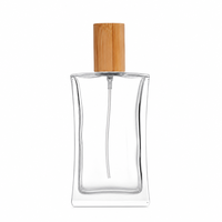 Flacon de parfum rectangulaire en verre de luxe 100 ml, finition mate, logo personnalisé, bouchon en bois avec impression sérigraphique et marquage à chaud