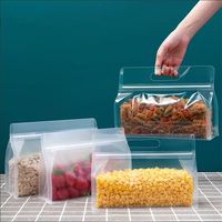 Vente en gros Sacs alimentaires PE à fermeture éclair Emballage de pochette debout en plastique transparent givré avec poignée de magasinage et fermeture éclair