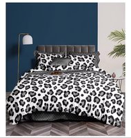 Offre Spéciale : Parure de Lit Luxe 4 Pièces en Satin Imprimé Léopard – Housse de Couette, Couette et Draps