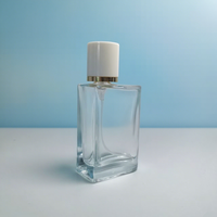 Bouteille de parfum en verre transparent rectangulaire unique de 100ml vide pour diffuseur de parfum pour femme avec pulvérisateur à pompe pour cadeau