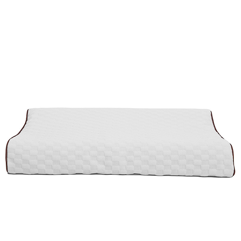 Funda de almohada infantil color nude con diseño de colmena.