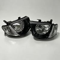 Ensemble de phares avant halogènes, ajustement OE, lentille transparente blanche, vente directe d'usine pour Mitsubishi L200 05