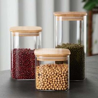 Grosir stoples penyimpanan makanan kaca persegi dengan tutup bambu ramah lingkungan dapur kaleng kedap udara untuk gula kopi biji