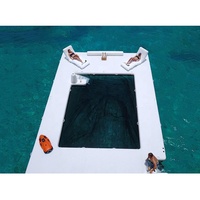 Piscine flottante gonflable multi-personnes en teck EVA avec filet et échelle en corde pour les vacances à l'océan
