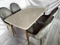 Meubles de maison modernes avec table à manger en marbre à pieds métalliques pivotants