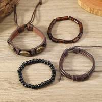 Shell multicouche perlé bois perle tissé à la main Bracelet en cuir quatre pièces ensemble en gros N25614