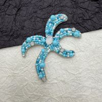 Applique en tissu décorative artisanale en forme d'étoile de mer et de corail, ornée de perles et de paillettes, à coudre pour vêtements, chapeaux, sacs et vêtements d'extérieur DIY
