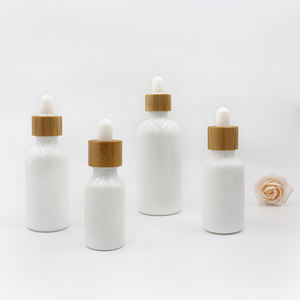 Botella de Vidrio Esmerilado Negro Ámbar de 1oz con Gotero de Madera, Botella Vacía para Aceite Esencial - Product Image 5