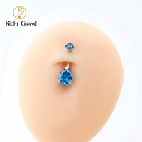 Anneaux de nombril en titane ASTM F136 de qualité implantable avec zircone cubique 5A en forme de goutte d'eau pour piercing