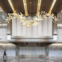 Lustre suspendu personnalisé en forme de fleur pour hôtel, villa, hall d'entrée, escalier, lampe suspendue LED, décoration moderne, long lustre en céramique en forme de feuille de Ginkgo
