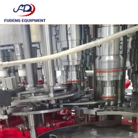 Machine de remplissage 99 % neuve à 24 têtes, contrôlée par PLC, haute performance, 12 000 bph pour bouteilles en plastique, eau pure et boissons