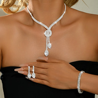 Parure de bijoux haut de gamme personnalisée pour femme, créative, pour mariage, avec diamants apparents et franges, comprenant boucles d'oreilles et collier pour mariée et banquet
