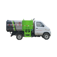 Mini camion à ordures compacteur diesel à chargement latéral avec crochet latéral, boîte de vitesses manuelle, transmission 4x2, pompe pour bacs de 120L/240L