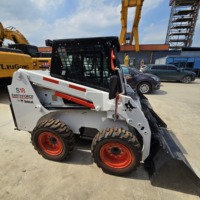Chargeuse compacte verticale d'occasion, capacité de charge nominale de 850 kg+, stabilité améliorée pour la manutention de matériaux à grande portée
