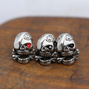 Pendientes de esqueleto yunnique, diseño de calavera con ojos rojos, de acero de titanio, joyería de moda - Product Image 2