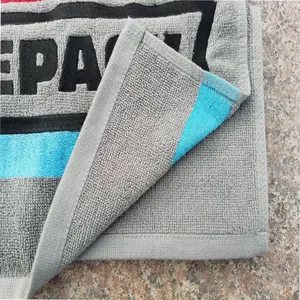 Hot selling customized grey or brown logo embroidered strong water absorption towel
