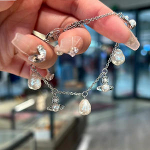 Collar Empress Dowager Vivienne, Estilo Punk Barroco de Lujo, con Perlas y Circonitas, Diseño de Saturno, Chapado en Oro Rosa sobre Plata de Ley, para Mujer - Product Image 1