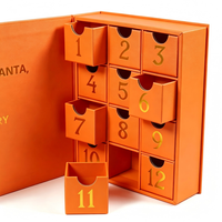 Boîte de calendrier de l'avent de Noël haut de gamme en forme de livre, boîte à bijoux avec 12 tiroirs, impression de numéros en feuille d'or, boîte cadeau en papier rigide
