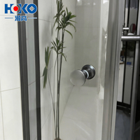 Cabine de douche coulissante moderne HOKO en acrylique gris avec cadre en aluminium noir mat, design salle de bain vapeur